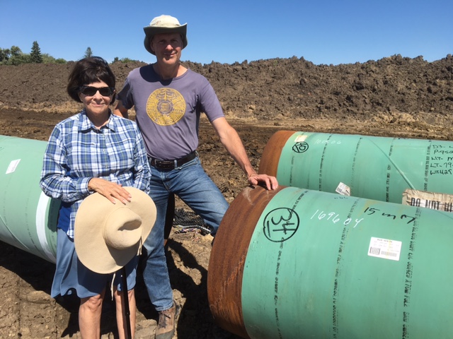 Iowa landowner Cyndy Coppola and Bold Iowa director Ed Fallon on Cyndy's land where the Dakota Access pipeline is being constructed. 